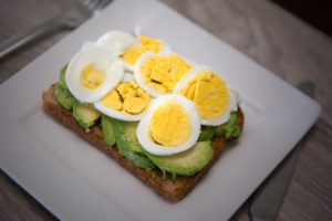 hard boiled eggs on avocado toast