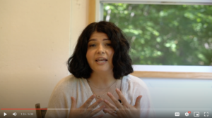 Screenshot from video with Lindsey Huttner discussing the five stages of grief you might experience after suffering from a miscarriage or infant loss